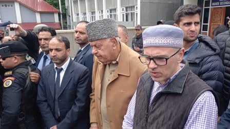 NC President Farooq Abdullah (L) along with son Omar Abdullah talk to the media after casting vote for the Srinagar Lok Sabha seat in Srinagar on Monday May 13, 2024