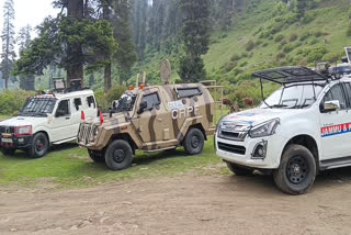 Armoured vehicles on standby during an encounter in the forests of Shopian, Jammu and Kashmir on Tuesday, May 13, 2025