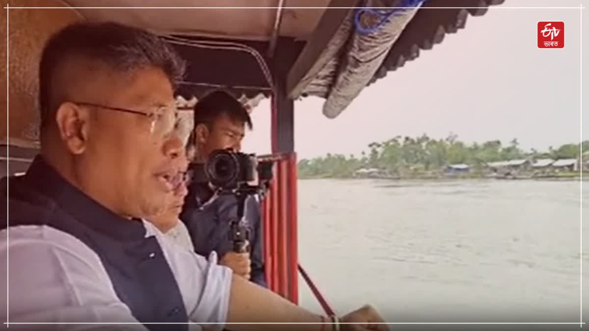 Pijush Hazarika inspects erosion site