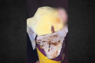 A snapshot circulated on the internet shows a human finger protruding from the ice cream's top portion.