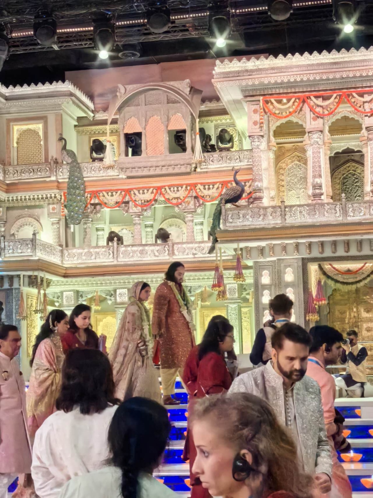 On July 12, Anant Ambani and Radhika Merchant tied the knot in a breathtaking wedding ceremony. The youngest son of Mukesh Ambani, the chairman of Reliance Industries, and the daughter of pharma moguls Viren and Shaila Merchant, exchanged vows in a fairytale-like setting, surrounded by a dazzling array of international celebrities and high-profile guests from various fields.