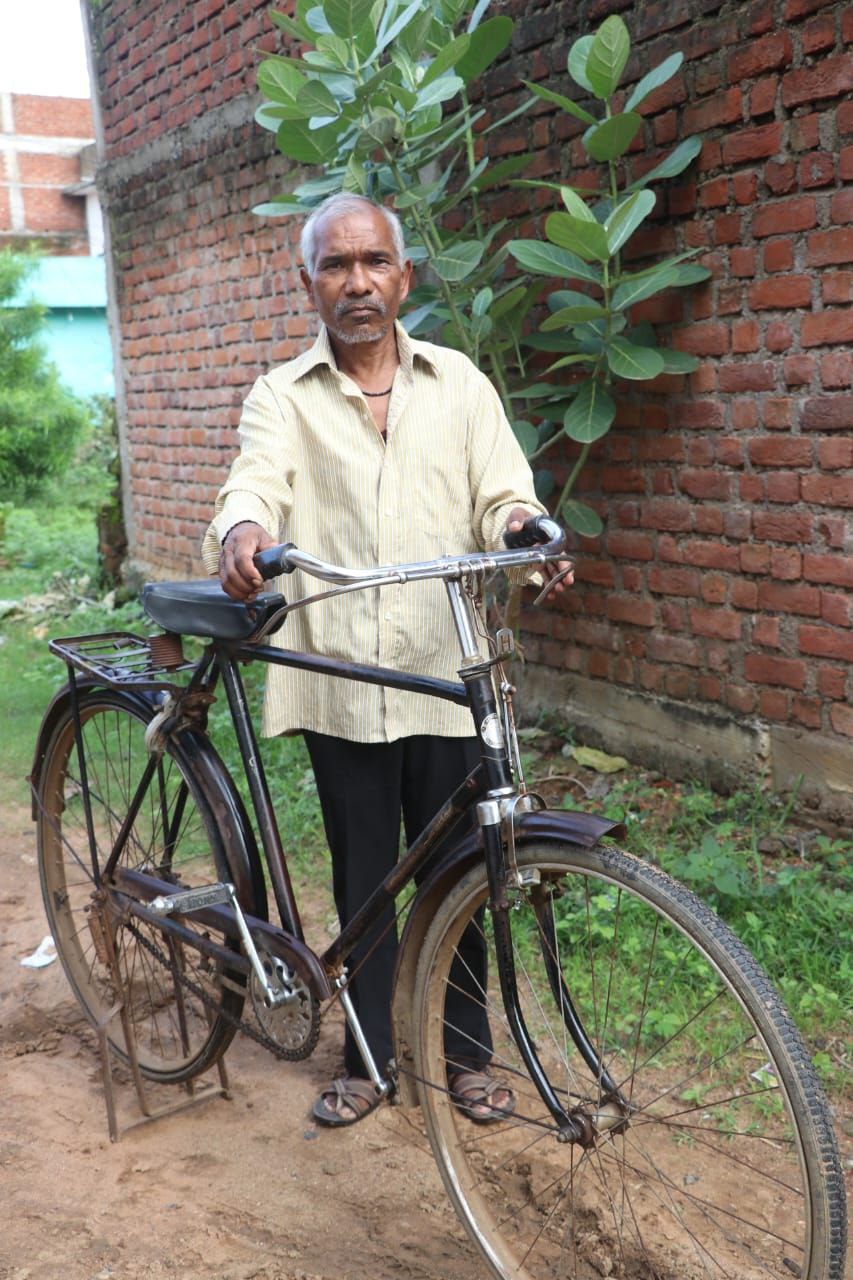Premlal Panika and hid bicycle