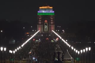 Iconic buildings lit up with tricolor lights