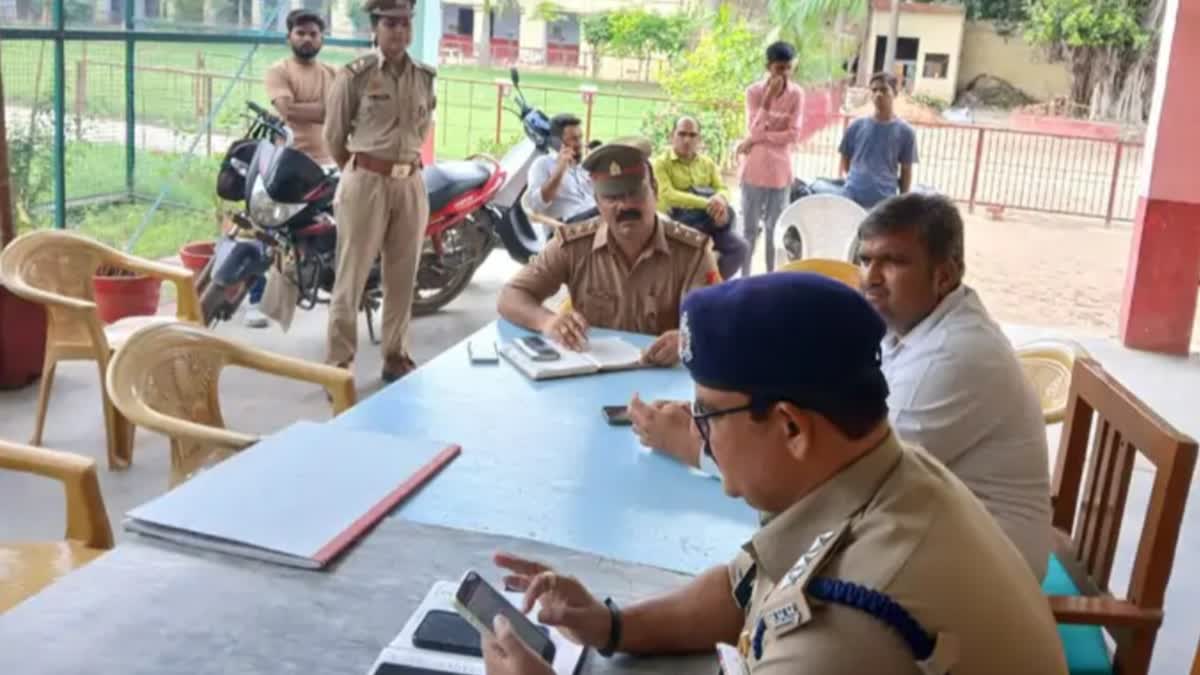 Police officers at Bilhaur Inter College in Kanpur amid Hijab row