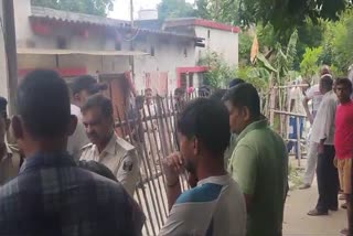 Police question locals outside government quarters (CB 38) of Bhagalpur Police Line in Bihar in connection with mass murder