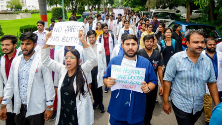 King George Medical University doctors raise slogans as they take out a protest rally demanding justice for the alleged sexual assault and murder of a female postgraduate trainee doctor of Kolkata RG Kar Medical College, in Lucknow on Monday.