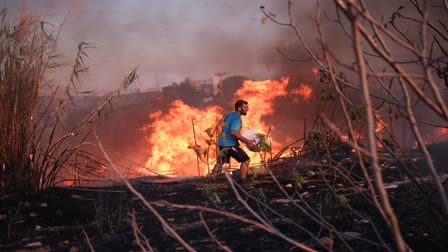 dangerous blaze spirals out of control in Athens