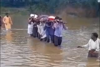 Funeral procession taken out river