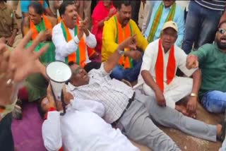 Protest by lying on the road