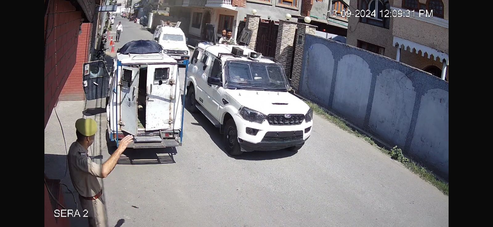 Armoured police vehicles outside residence of Mirwaiz Umar Farooq