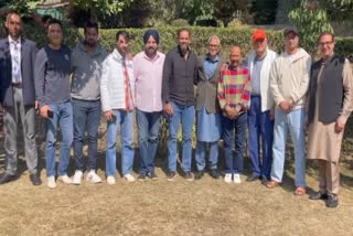 Yousuf Pathan and others with Omar Abdullah at the latter's residence in Srinagar.