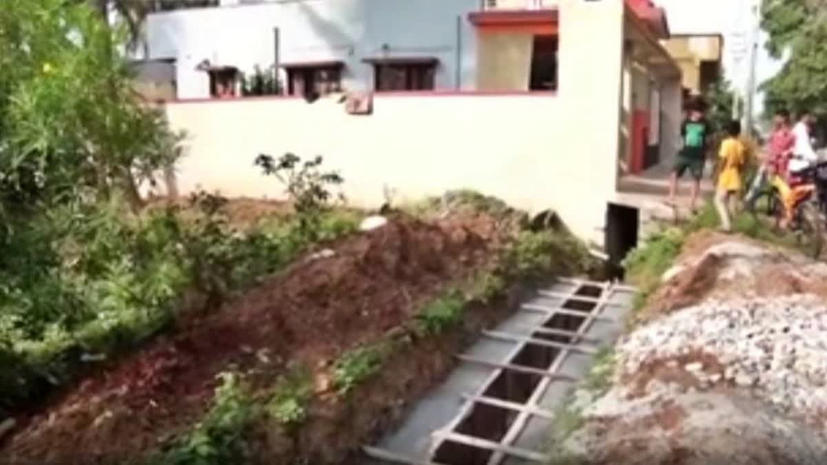 drainage infront ho his home