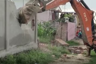 BULLDOZING OF CONVICTS HOUSE