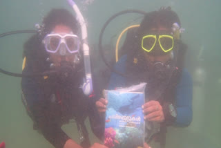 Under water book release  Book launch on coral reefs under the sea  പവിഴപ്പുറ്റുകൾ കടലിലെ മഴക്കാടുകൾ  rainforests of the sea  coral reefs  പവിഴപ്പുറ്റ്‌  പുസ്‌തക പ്രകാശനം കടലിനടിയില്‍  Book Launch Under the Sea  കോവളത്ത്‌ പുസ്‌തക പ്രകാശനം  Book launch at Kovalam