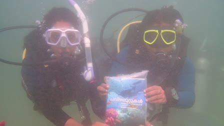 Under water book release  Book launch on coral reefs under the sea  പവിഴപ്പുറ്റുകൾ കടലിലെ മഴക്കാടുകൾ  rainforests of the sea  coral reefs  പവിഴപ്പുറ്റ്‌  പുസ്‌തക പ്രകാശനം കടലിനടിയില്‍  Book Launch Under the Sea  കോവളത്ത്‌ പുസ്‌തക പ്രകാശനം  Book launch at Kovalam