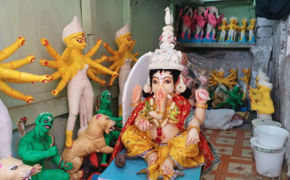 potters of Kumartuli in Kolkata making idols for Ganesh Puja