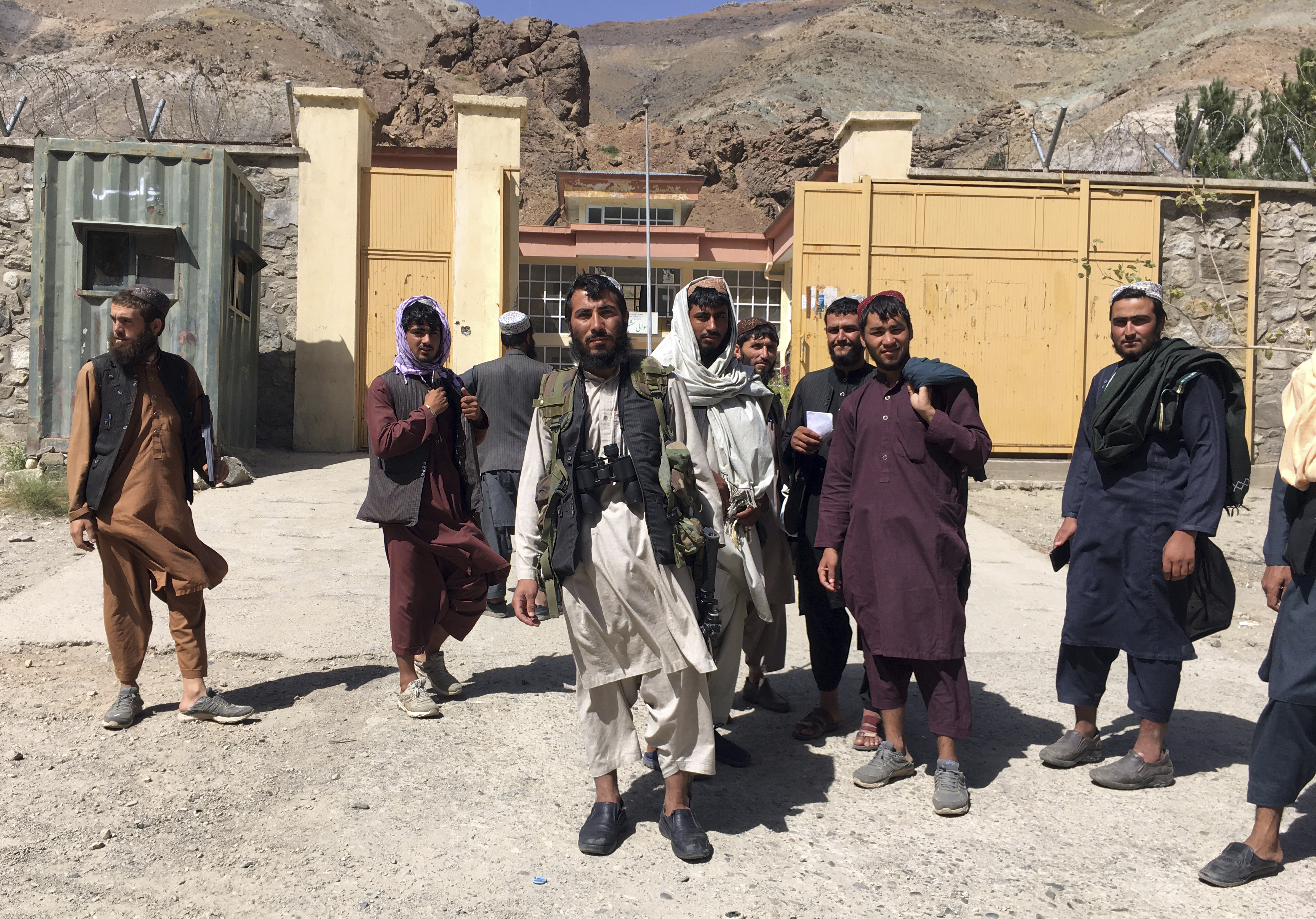 Taliban soldiers pose for a photograph in Panjshir