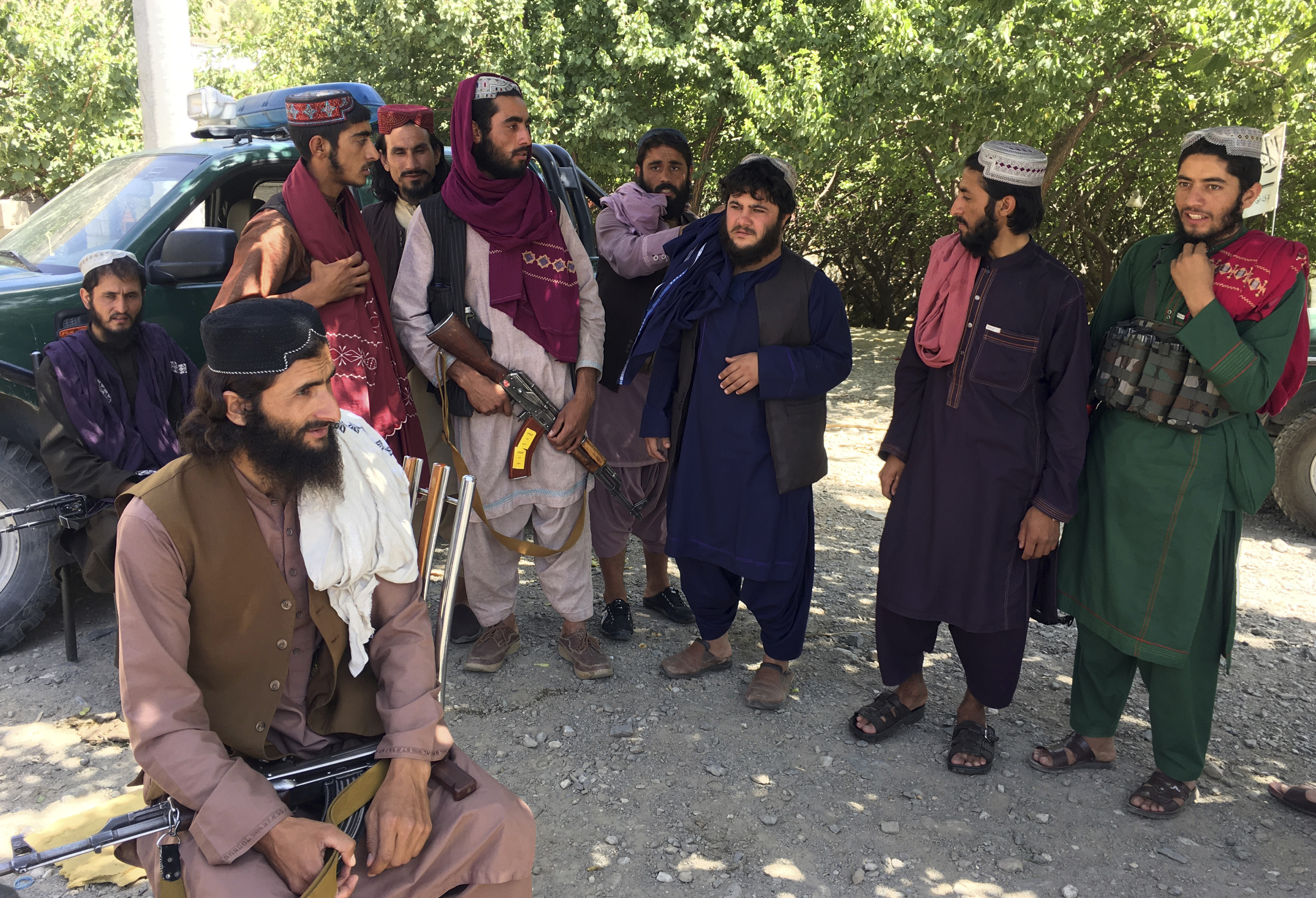 Taliban soldiers pose for a photograph