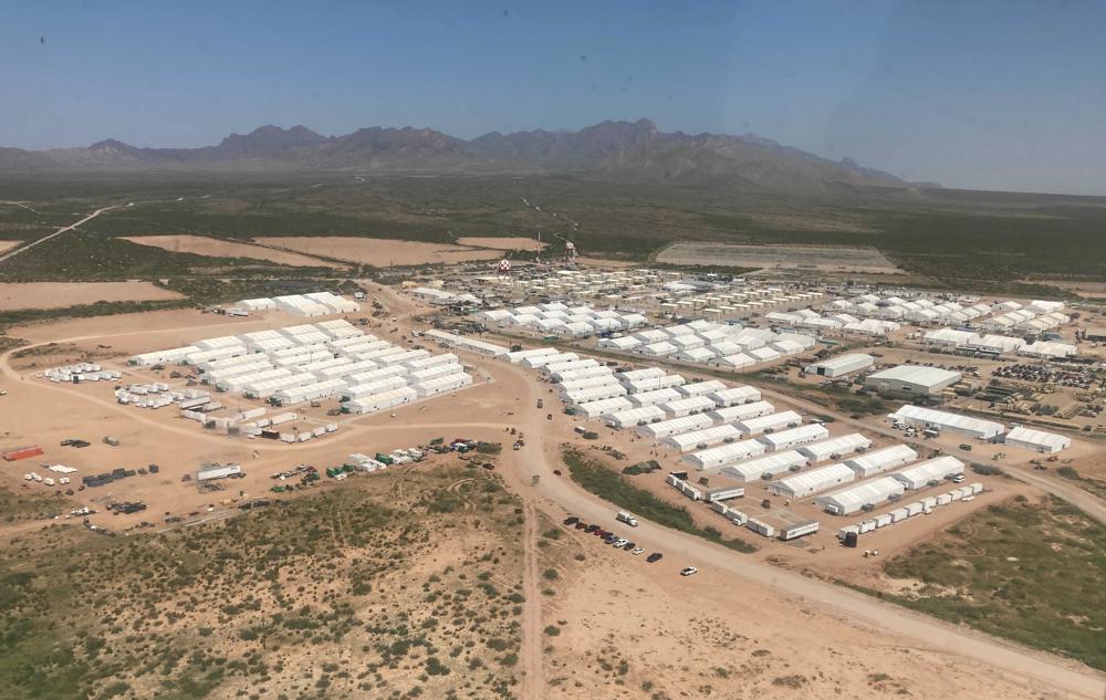 An aerial view of Fort Bliss' Doña Ana Village in New Mexico is seen Friday, Sept. 10, 2021. The Biden administration provided the first public look inside the U.S. military base where Afghans airlifted out of Afghanistan are screened, amid questions about how the government is caring for the refugees and vetting them.