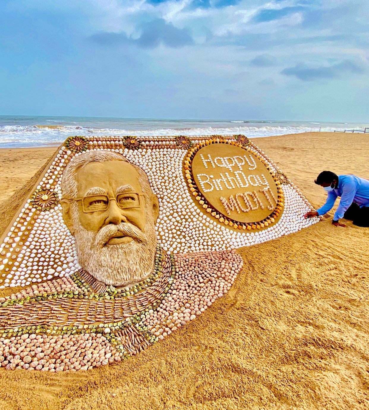 Sand artist Sudarshan Pattnaik's installation of PM with 2035 sea shells