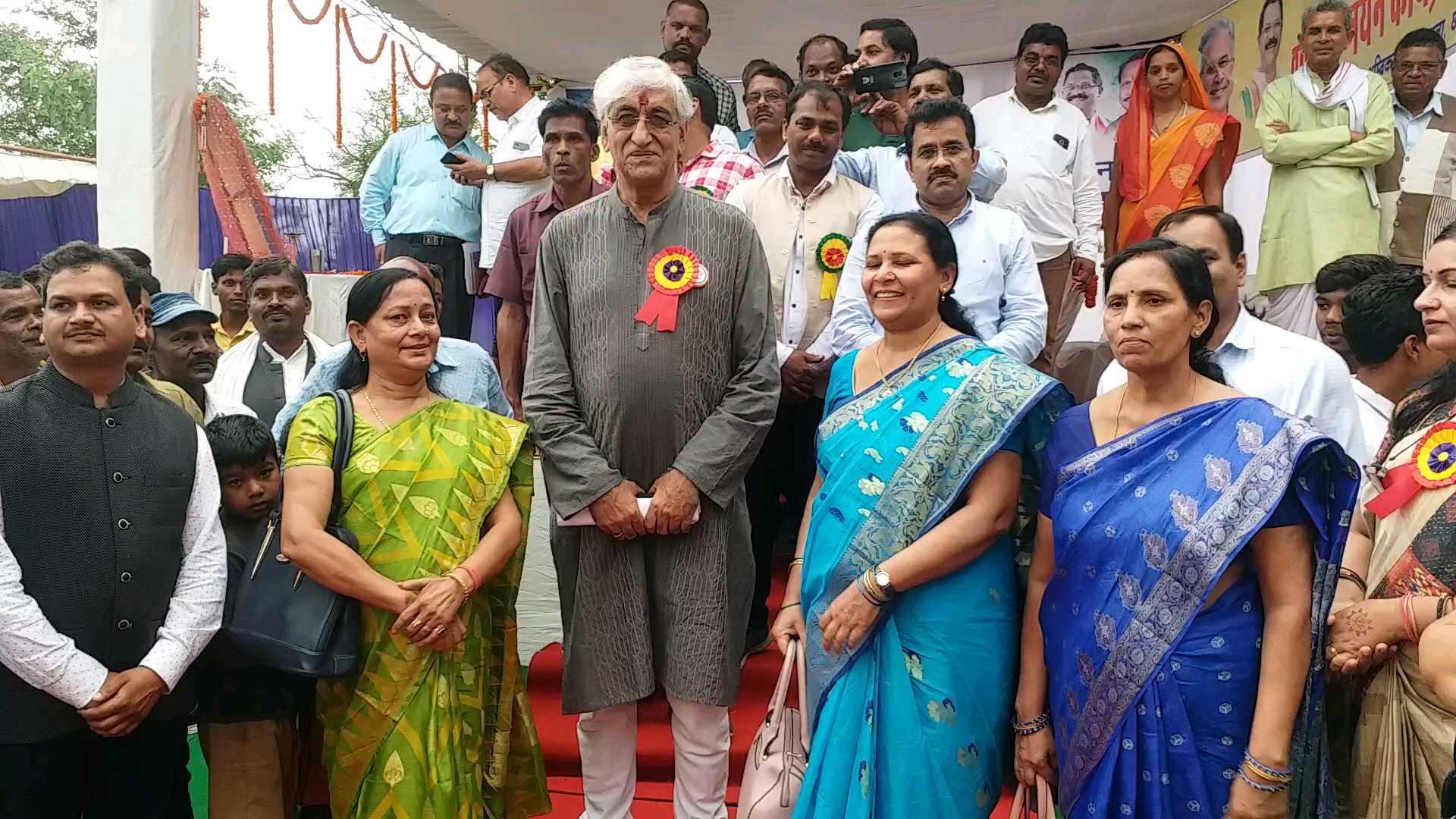 TS Singhdev posing for photographs with women at the event