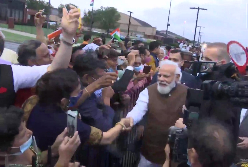 Prime Minister Narendra Modi meets people who were waiting to welcome him at Joint Base Andrews in Washington DC