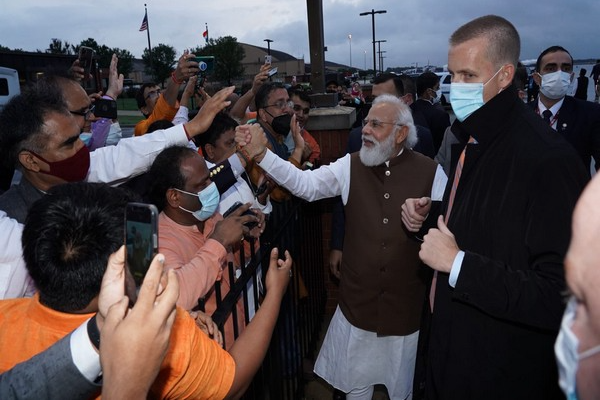 Prime Minister Narendra Modi meets people who were waiting to welcome him at Joint Base Andrews in Washington DC