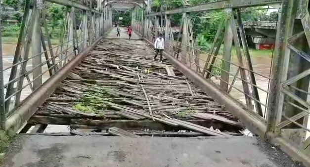 collapsed bridge of dikhow river