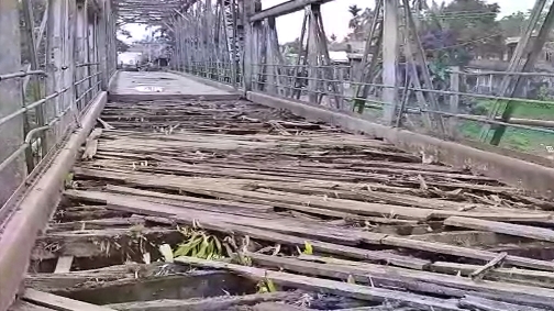 collapsed bridge of dikhow river