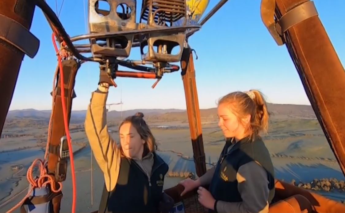 Hot air balloon operating women