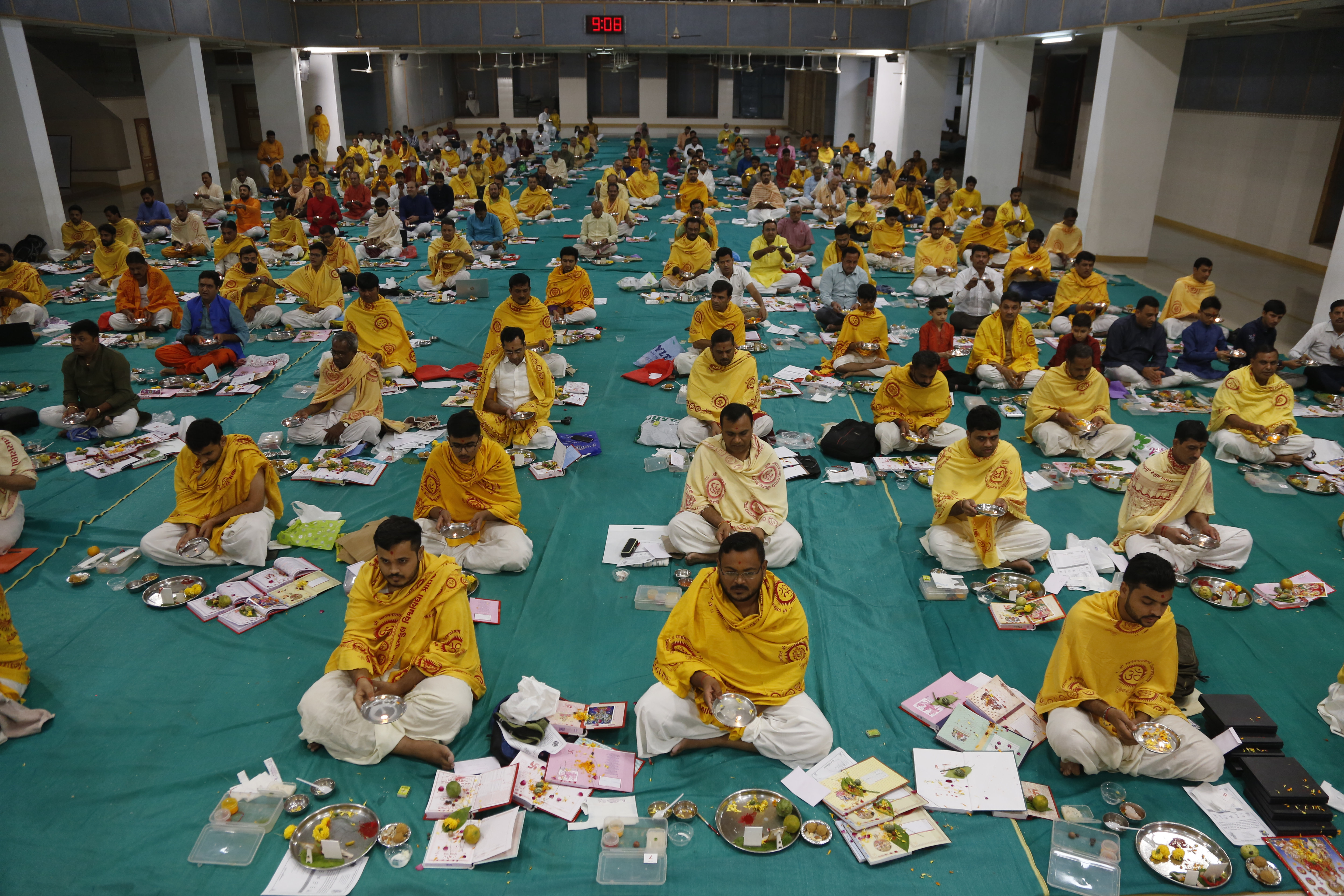 Traders perform rituals during Chopada Pujan