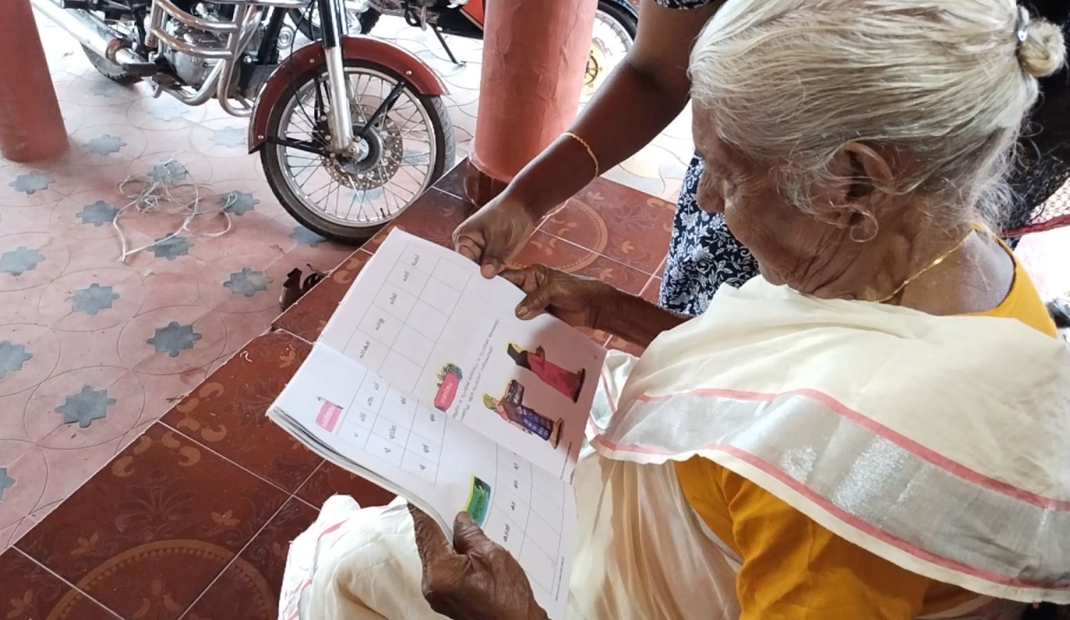 104 year old lady in literacy examination