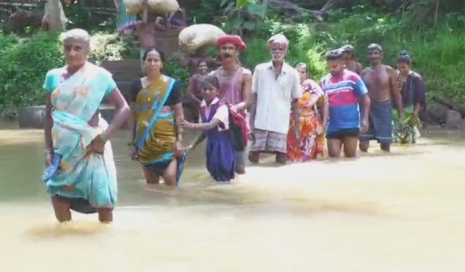 hosakuli villagers to cross stream