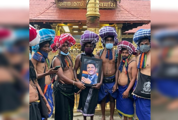 devotee reach to shabarimale holding  puneeth rajkumar photo