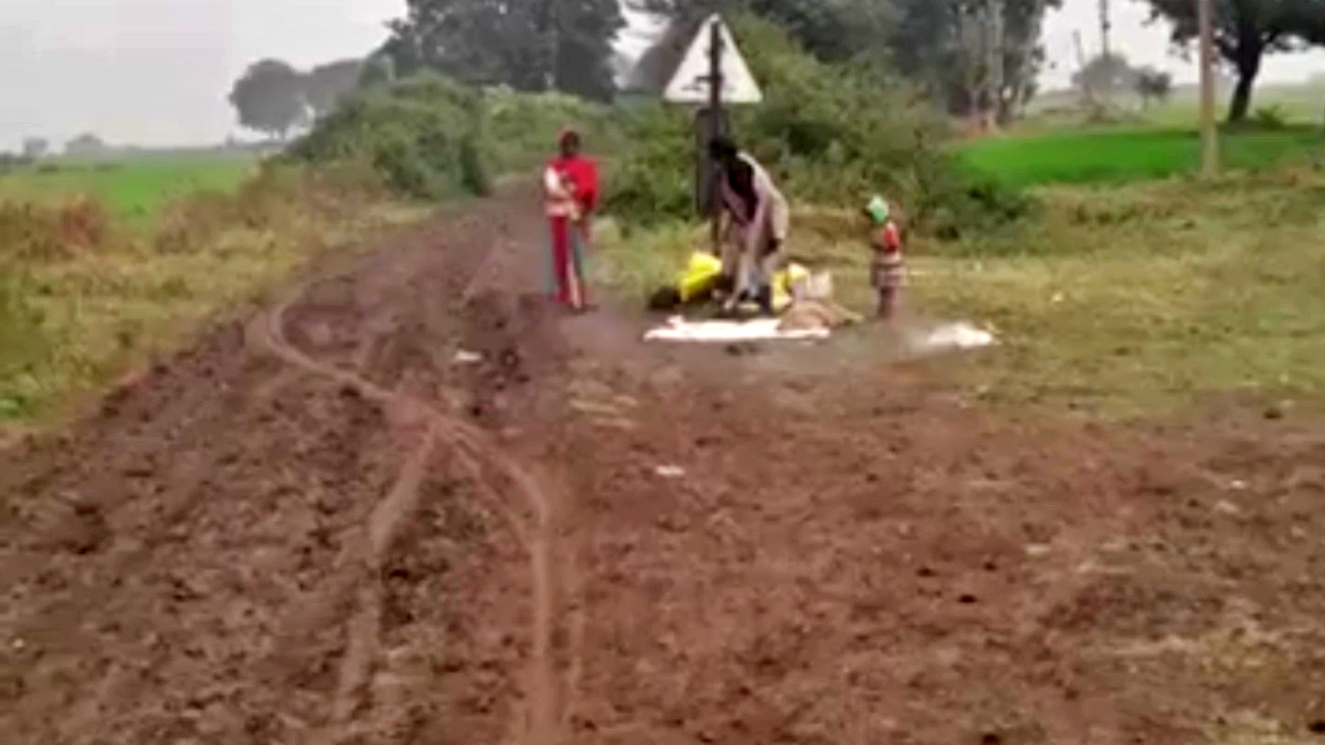 Delivery of woman near railway crossing