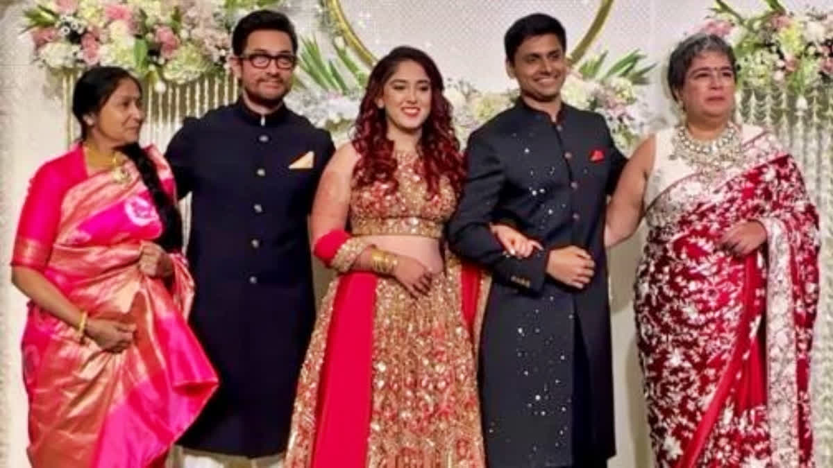 WATCH: Aamir Khan poses with newlyweds Ira-Nupur, others at Mumbai reception