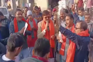 MLA Raj Sinha dancing and singing on songs