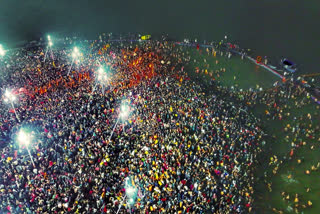 Image released by @myogiadityanath via X on Tuesday, Jan. 14, 2025, Devotees take a holy dip at the Sangam on the occasion of 'Makar Sankranti' festival, during the Maha Kumbh Mela 2025, in Prayagraj, Uttar Pradesh.