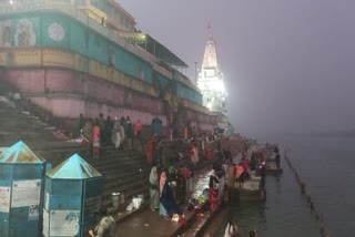 DEVOTEES DIP IN NARMADA RIVER