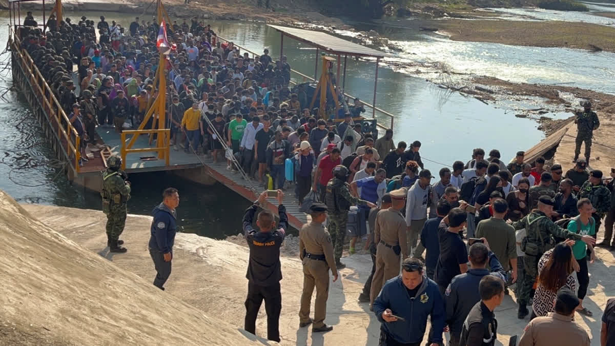 In this photo released by Royal Thai Army, more than 250 people from 20 nations who were reportedly rescued from alleged scam centers in Myanmar, as they crossed into Thailand's Tak province on Wednesday, Feb. 12, 2025.