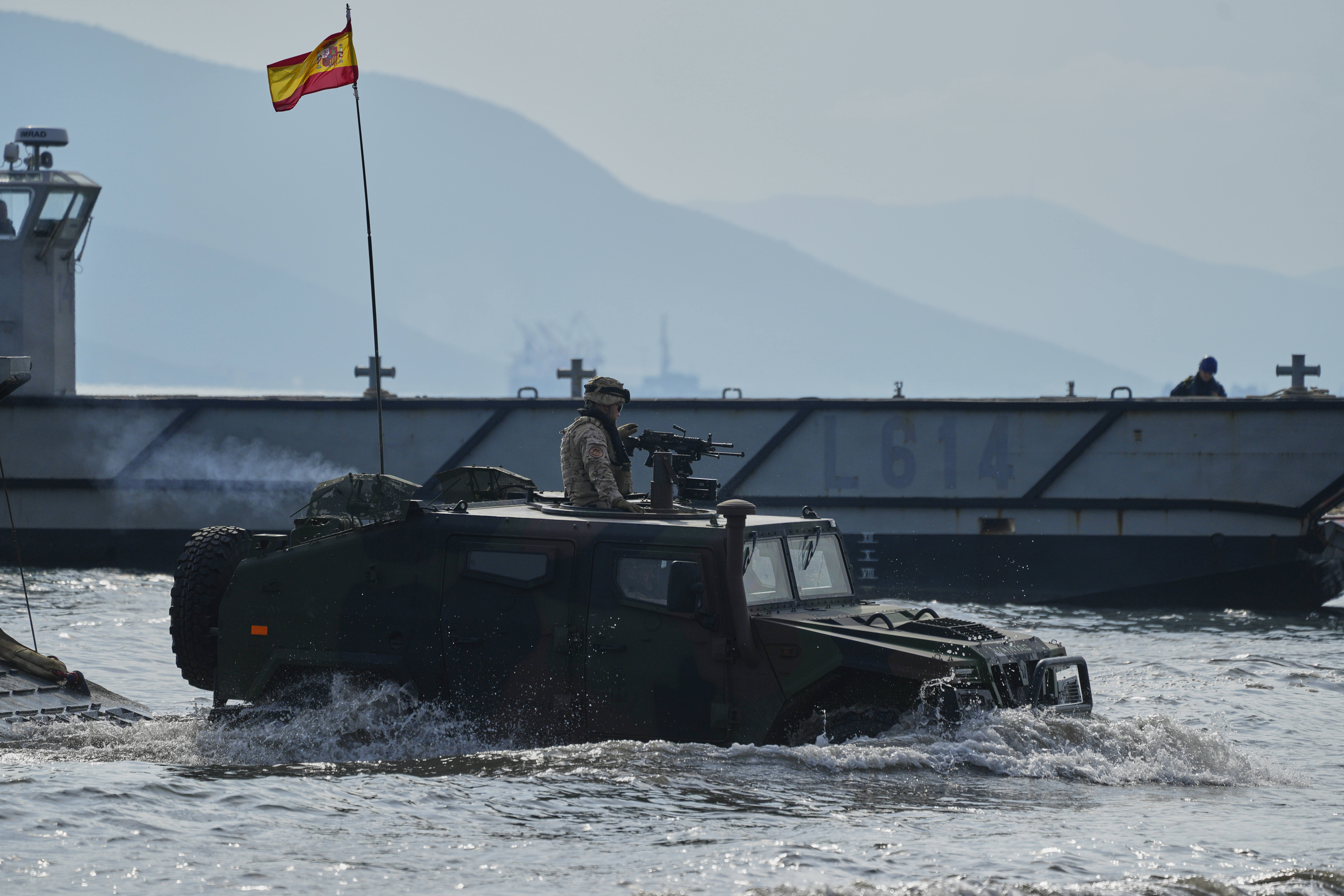 Special forces from Spain land on a beach as they participate in the Steadfast Dart 2025 exercise, involving some 10,000 troops in three different countries from nine nations and represent the largest NATO operation planned this year, in Nea Anchialos, central Greece, Thursday, Feb. 13, 2025.