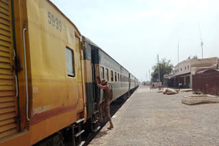 A paramilitary soldier takes position at a railway station near the attack site of a passenger train by insurgents, in Mushkaf in Bolan district of Pakistan's southwestern Balochistan province, Wednesday, March 12, 2025.