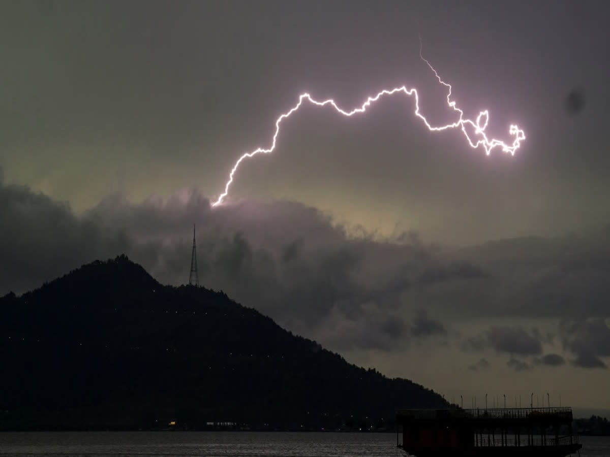 Tragic Lightning Strikes Kill Nine in Odisha: IMD Issues Urgent Red Alert to Save Lives 3 Three Of A Family Killed In Lightning Strike In Odisha's Koraput, IMD Issues Thunderstorm Warning In 19 Districts