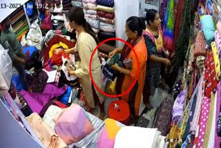 cctv-footage-of-a-woman-stealing-from-a-saree-shop-in-rajkot-has-gone-viral