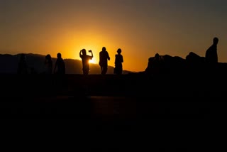 Death Valley visitors drawn to the hottest spot on Earth during ongoing US heat wave