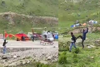 passenger-kicked-by-security-personnel-for-taking-selfie-on-helipad-in-kedarnath-dham-of-uttarakhand