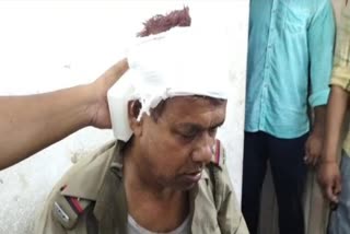 Police Attacked by Villagers
