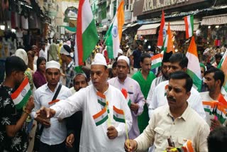 National flags distributed outside Ajmer dargah