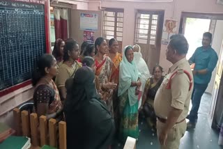 Women protested at the police station