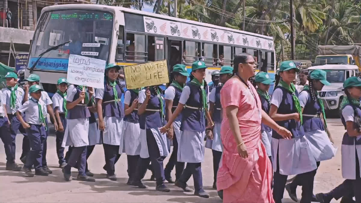 School students rain rally water awareness in theni